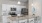 a kitchen with white cabinets