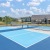 a tennis court with a fence