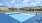 a tennis court with a fence