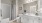 a bathroom with a tub sink and toilet